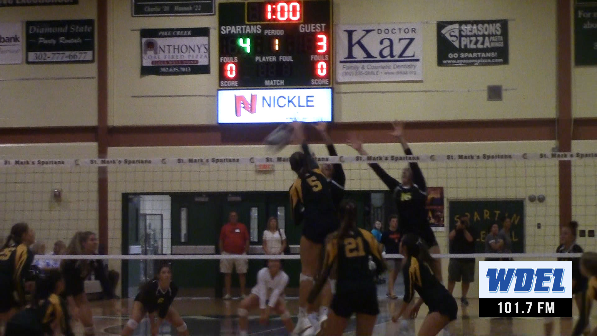 Saint Mark's Savannah Seemans spikes a point against Padua
